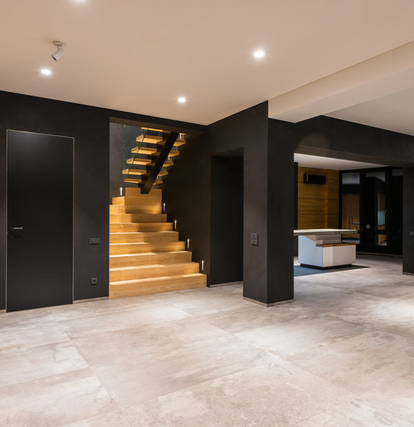 Modern interior with wood staircase